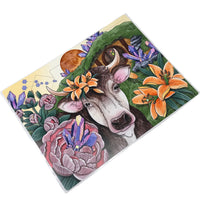 Colorful illustration of a cow with flowers and plants on a white background