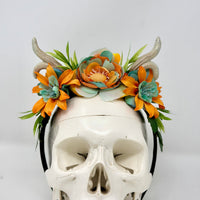 Whimsical Floral Crown with Antlers in Orange and blues
