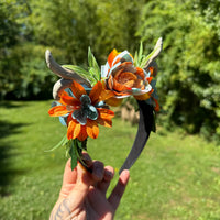 Whimsical Floral Crown with Antlers in Orange and blues